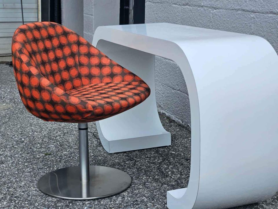 Orange & Brown Swivel Chair