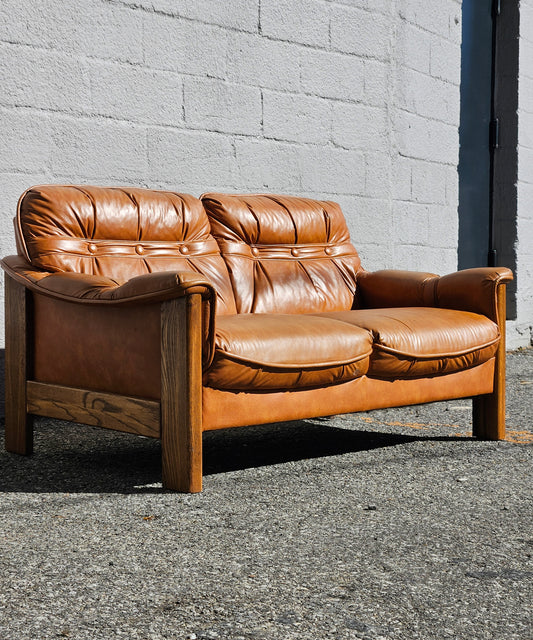 Naugahyde and Oak Loveseat