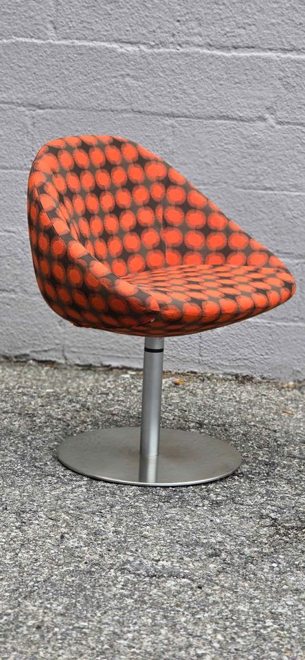 Orange & Brown Swivel Chair